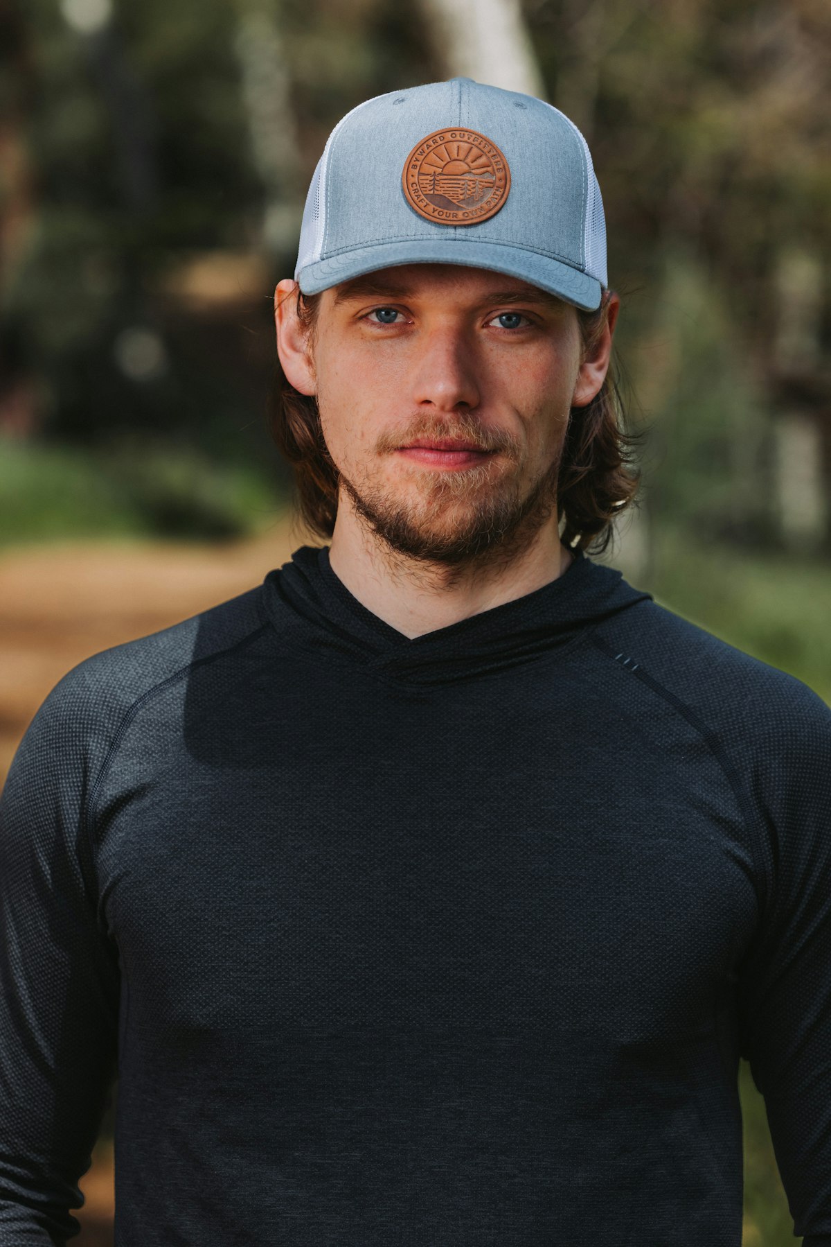Close-up of embroidered logo on a custom trucker hat