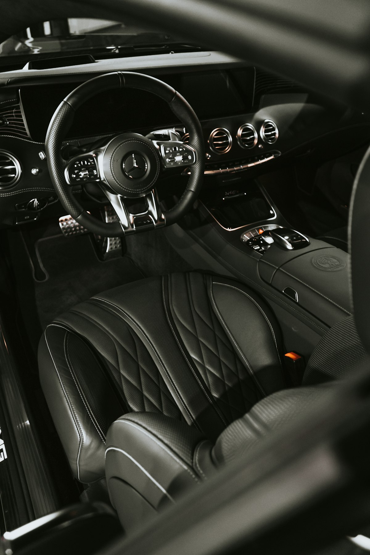 Car detailing professional polishing a vehicle