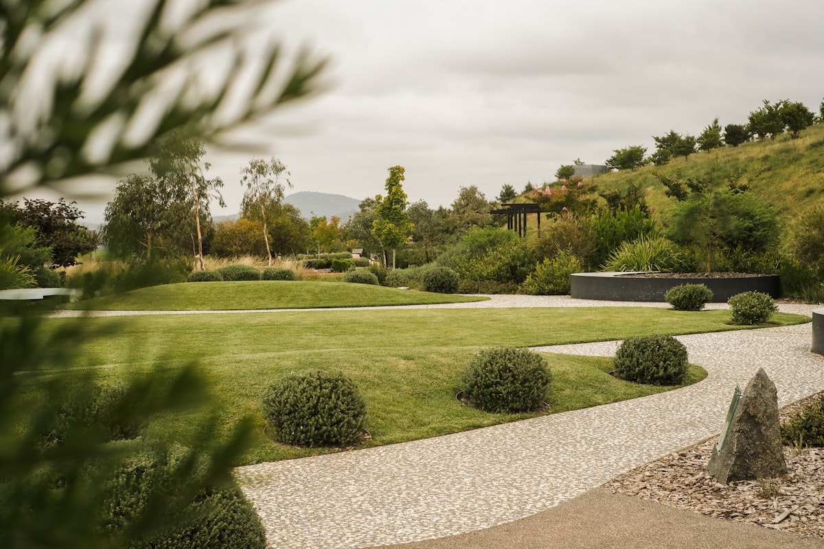 Landscape designer meeting with client on a job site